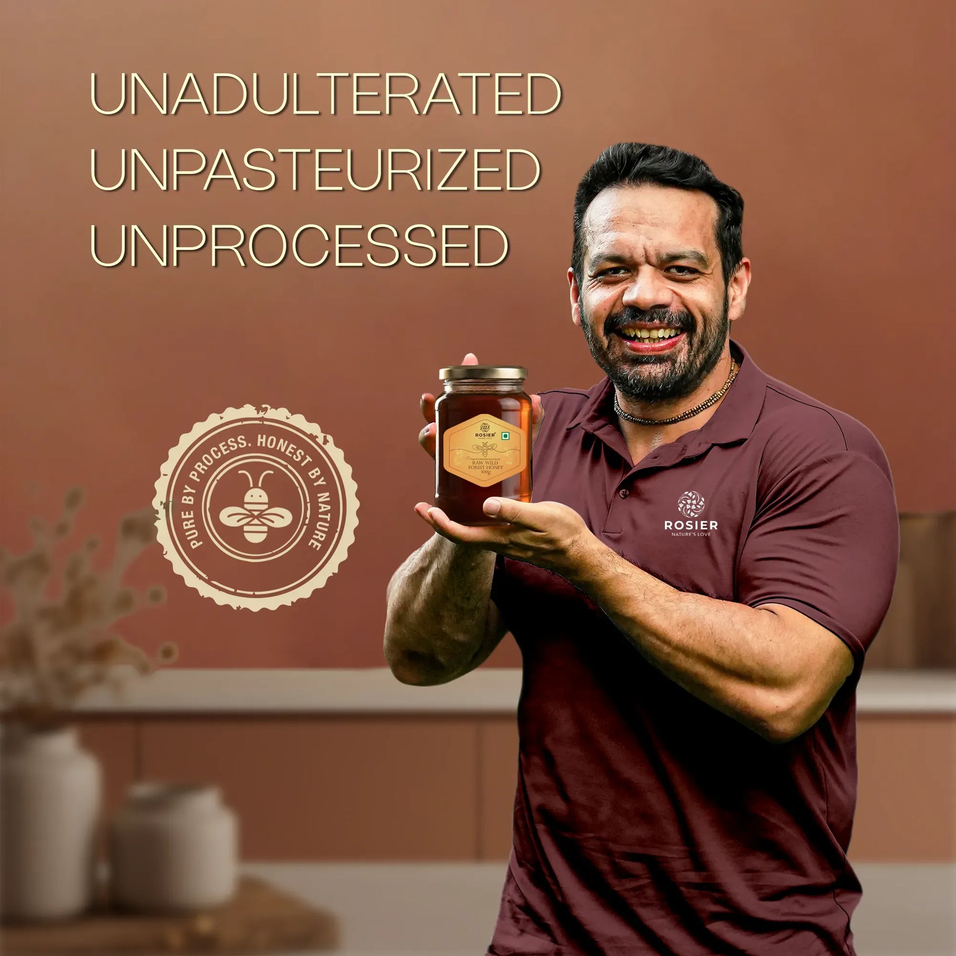 Ashoka Organics unadulterated, unpasteurized, unprocessed raw wild honey in a glass jar held by Gaurav Taneja.